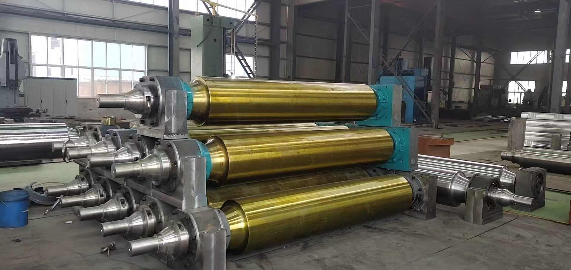 Dans quelles applications les composants de convoyeurs à rouleaux coulissants sont-ils principalement utilisés ?